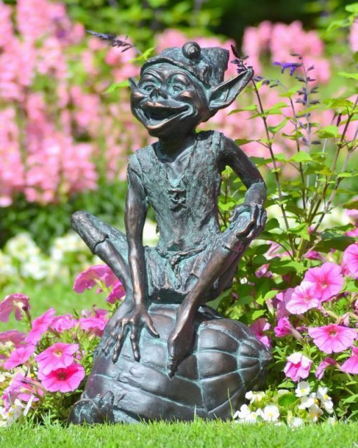 Pixie on a Snail Statue
