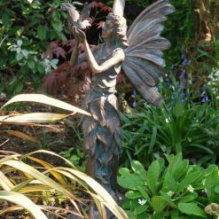 Fairy with a bird statue