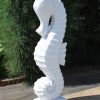 Marble effect statue of a seahorse.