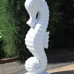 Marble effect statue of a seahorse.