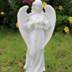Marble effect Angel for use in the garden.
