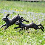 Rabbits running statue