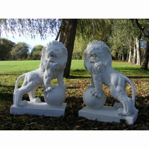 Garden ornament of two lions atop a globe.